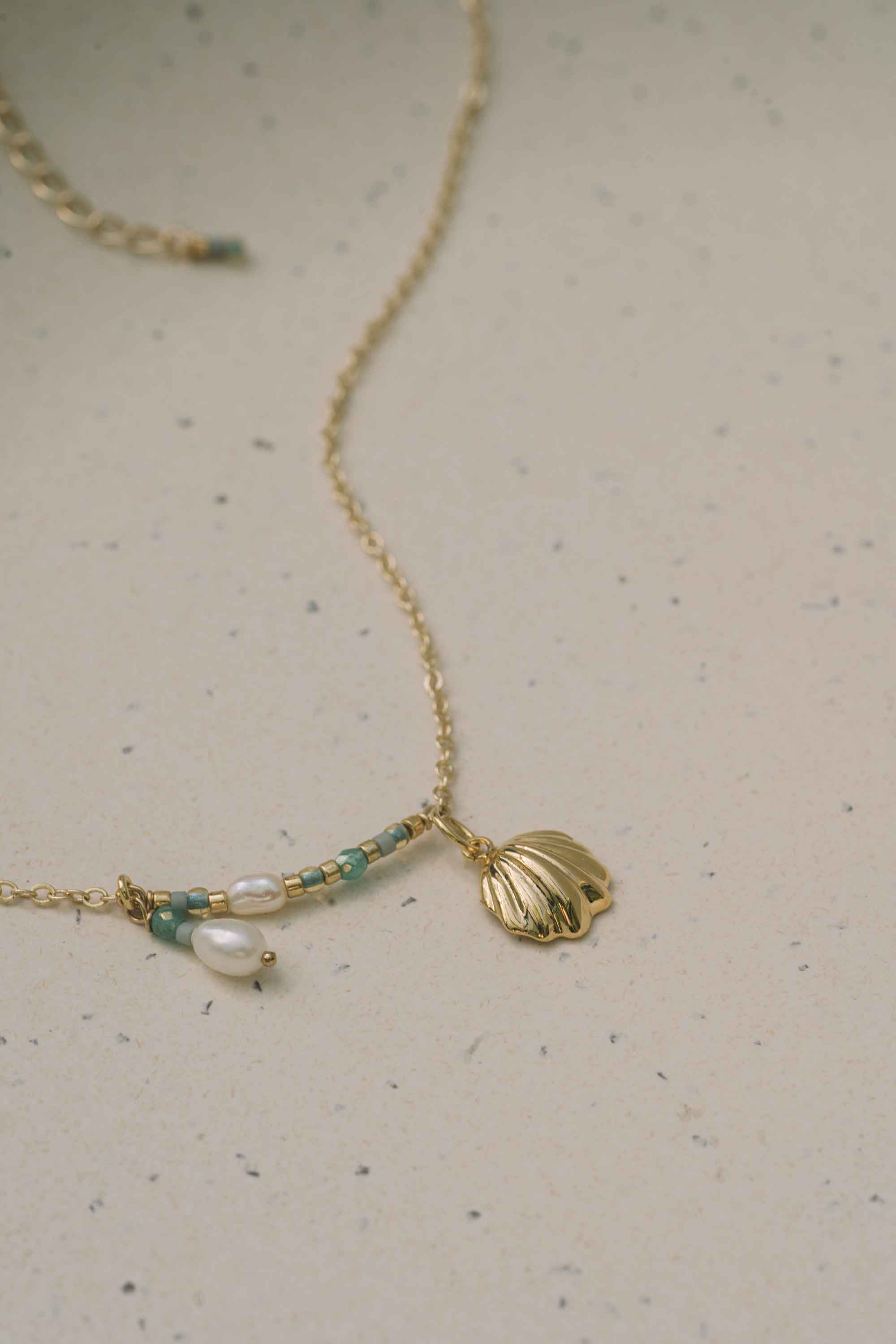 shell and pearl necklace gold and turquoise