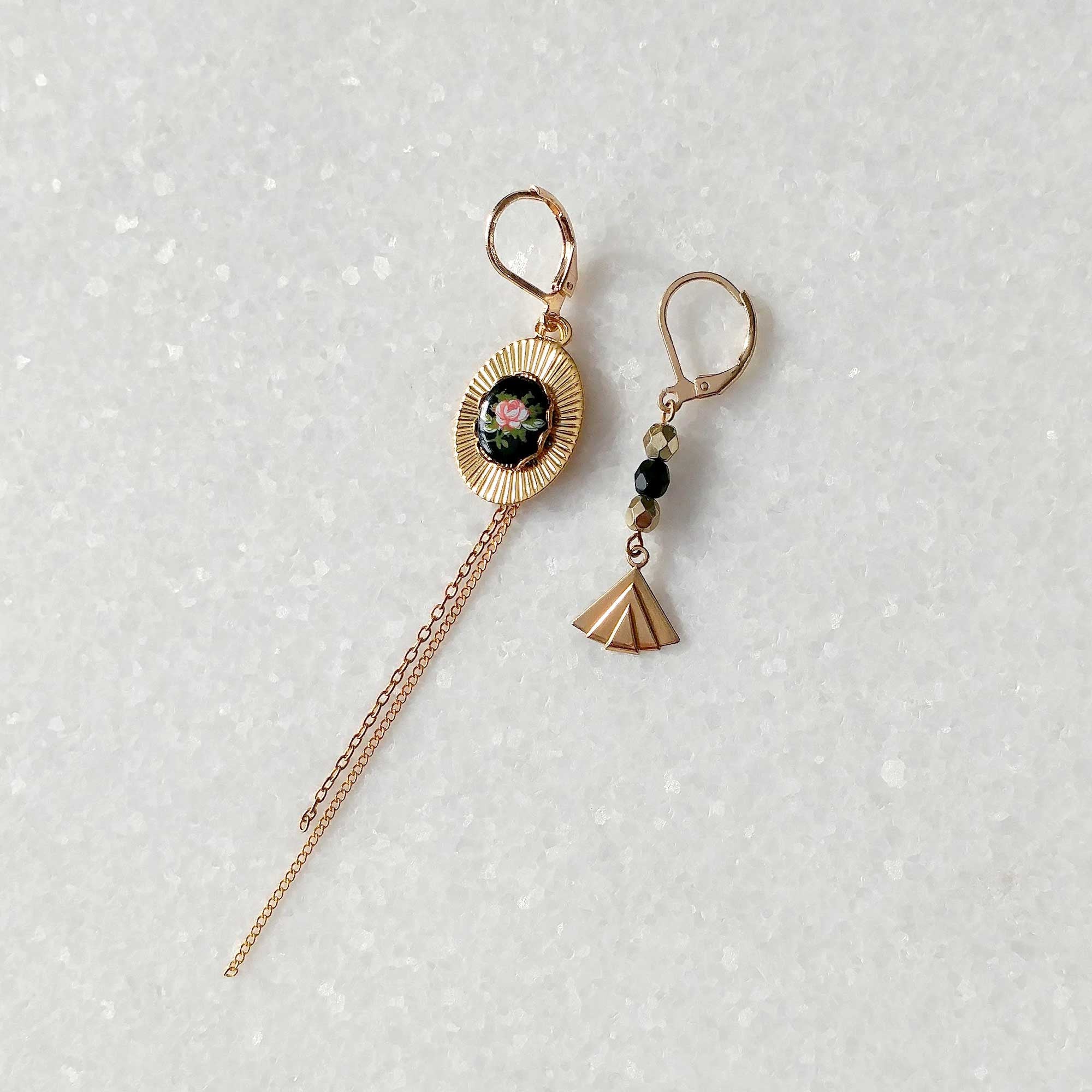 asymmetrical earrings black and gold brass