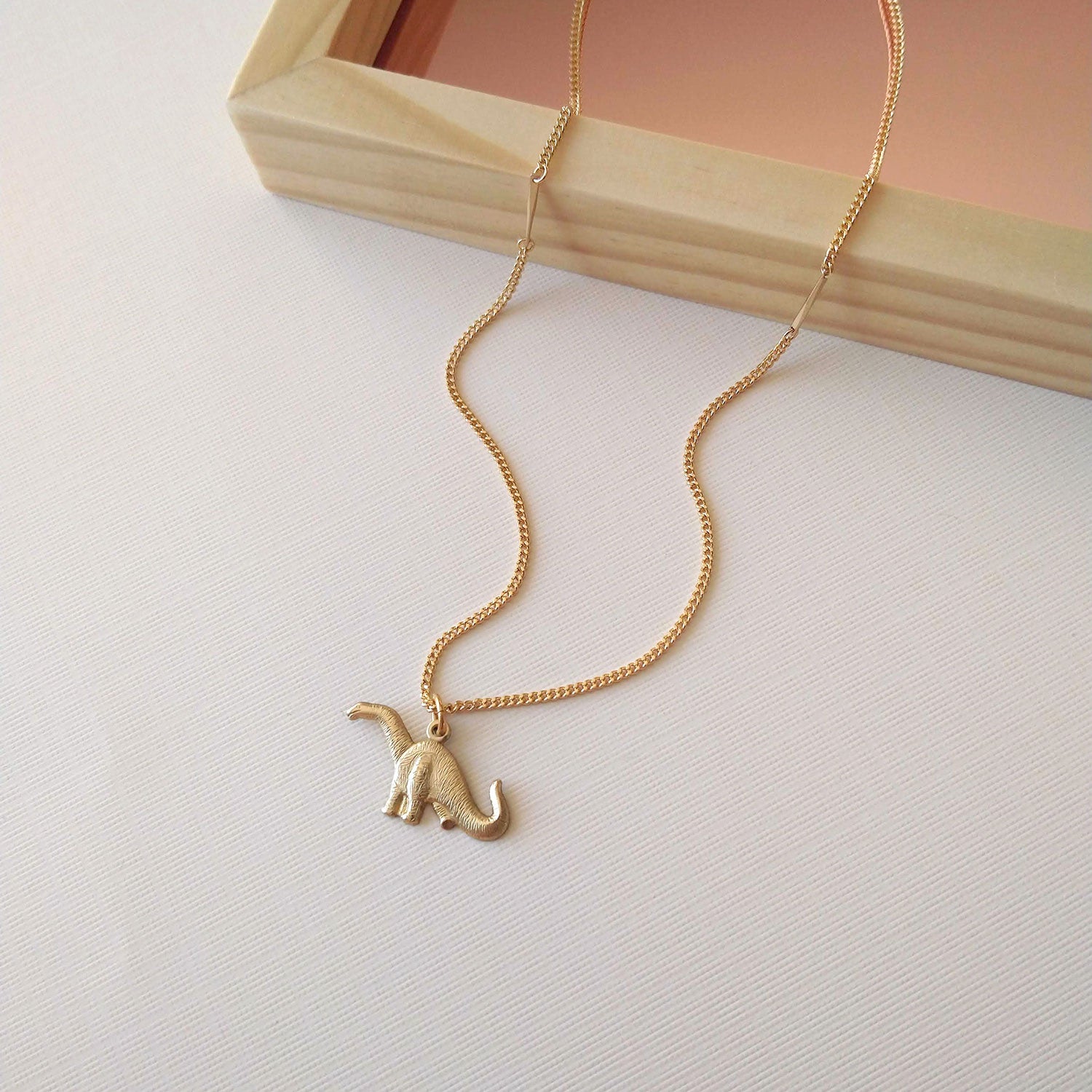 dinosaur charm necklace gold plated brass