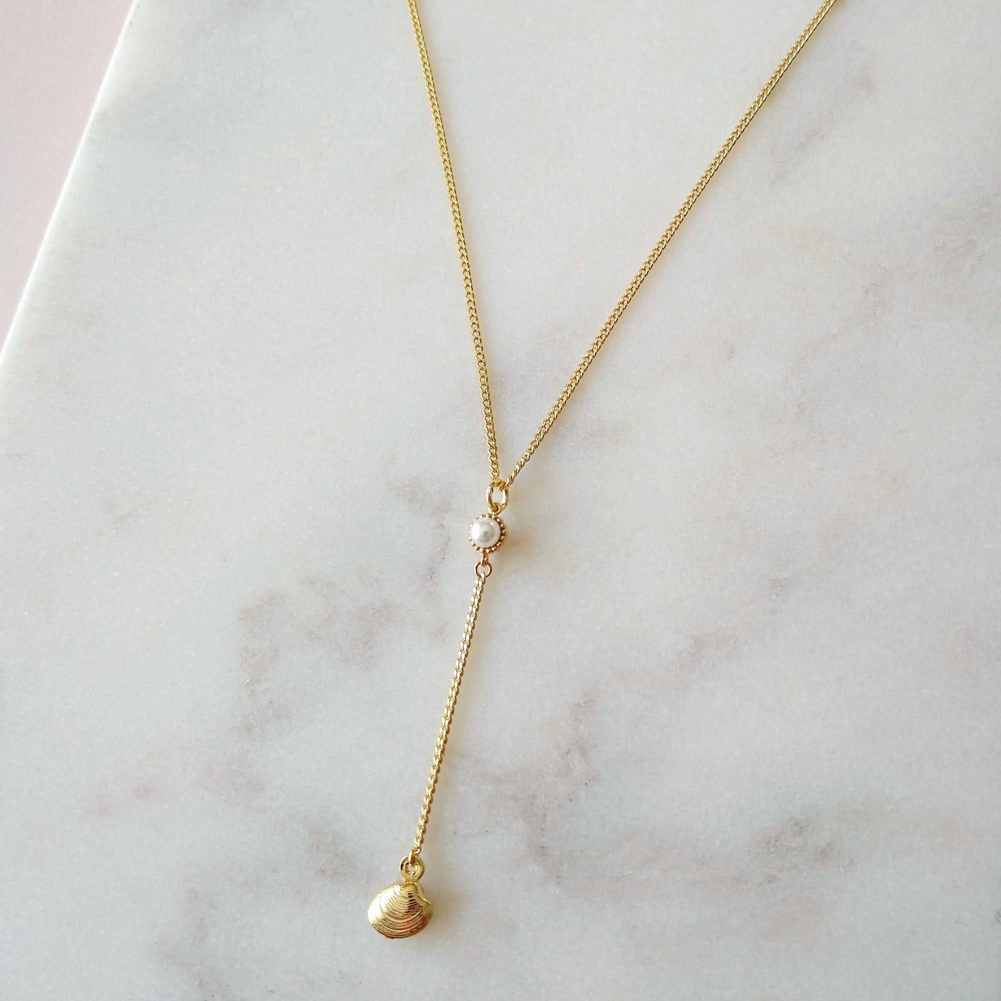 Lariat with pearl connector and oyster charm