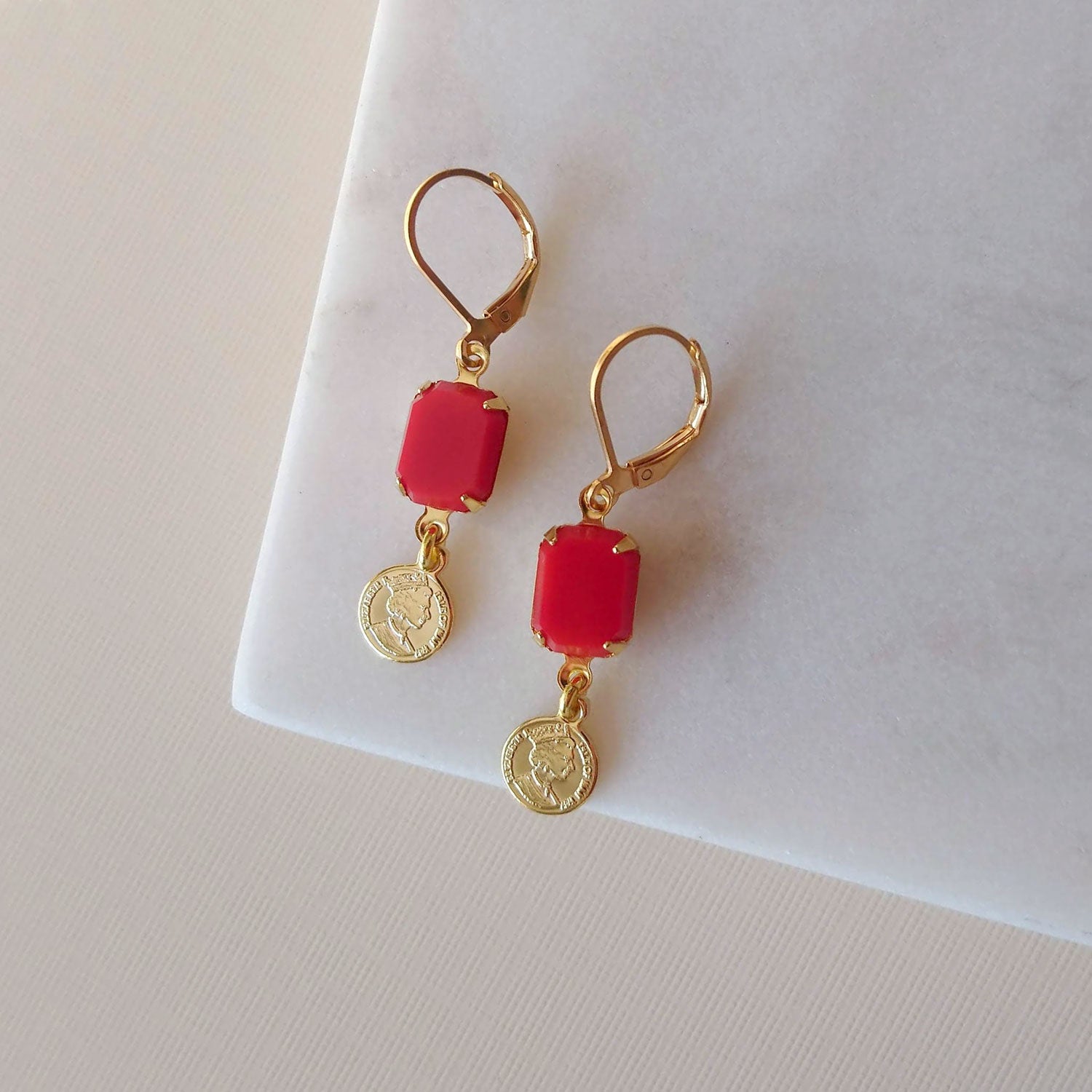 red earrings gold charm