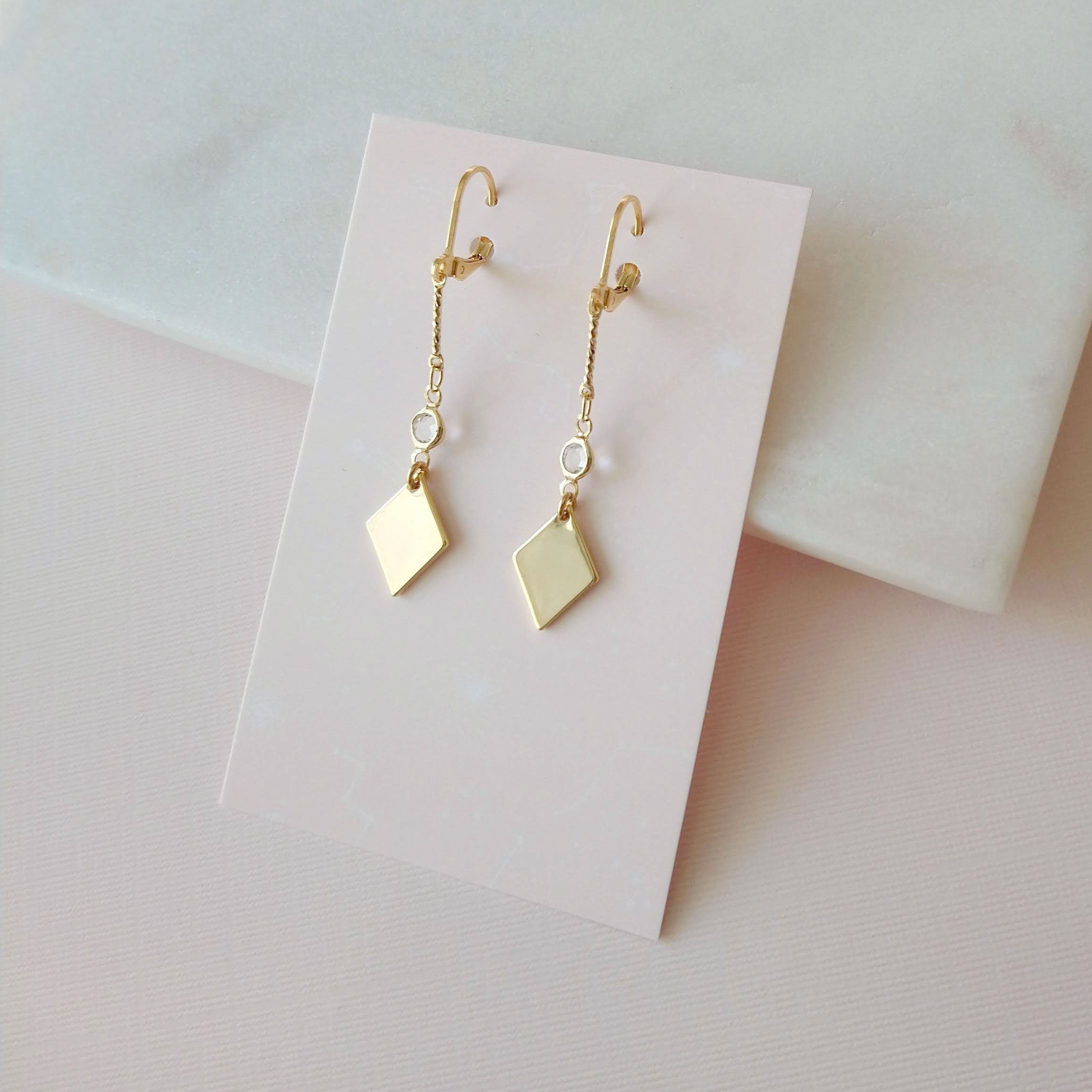 Boucles d'oreilles dorées et crystal