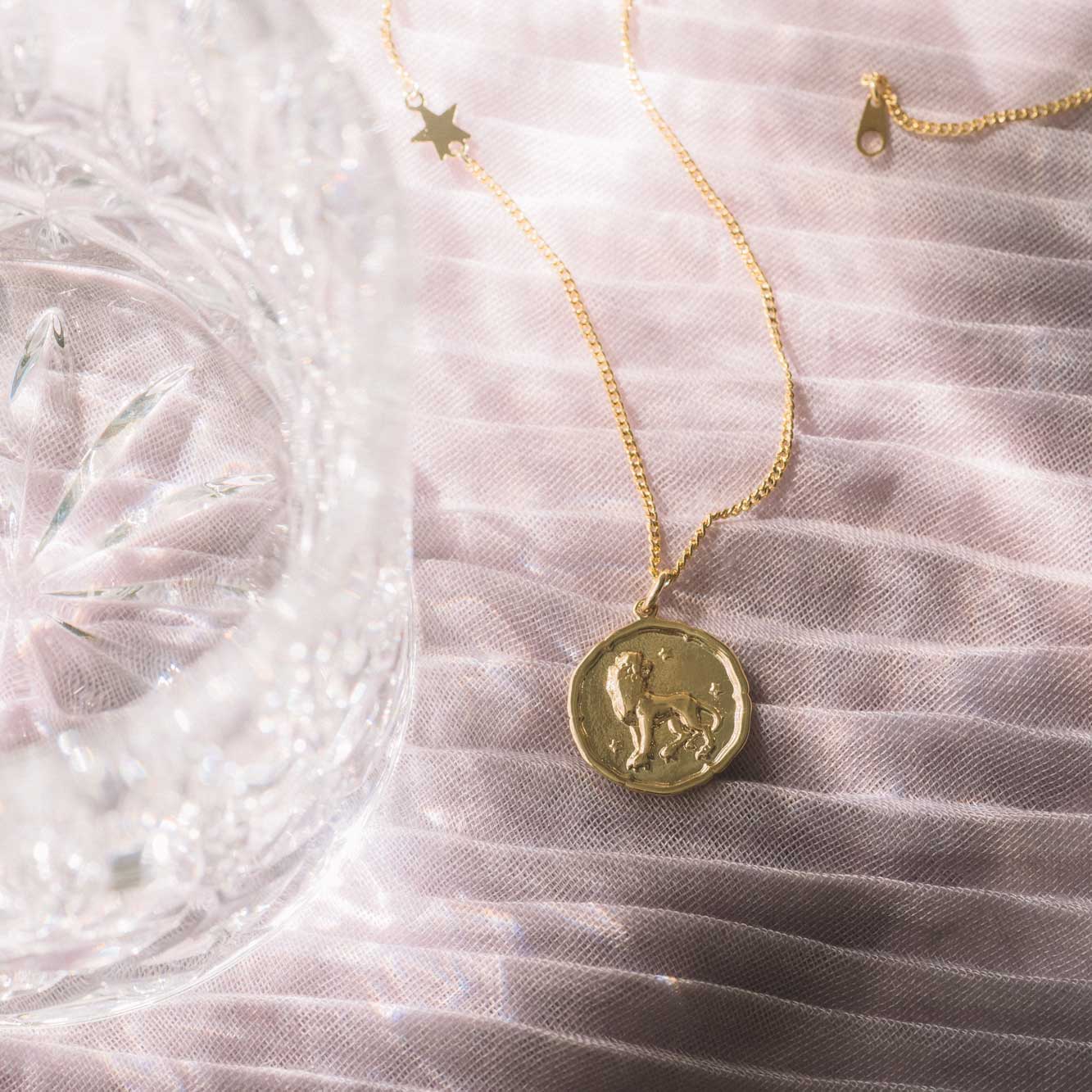 lion medallion chain pendant gold