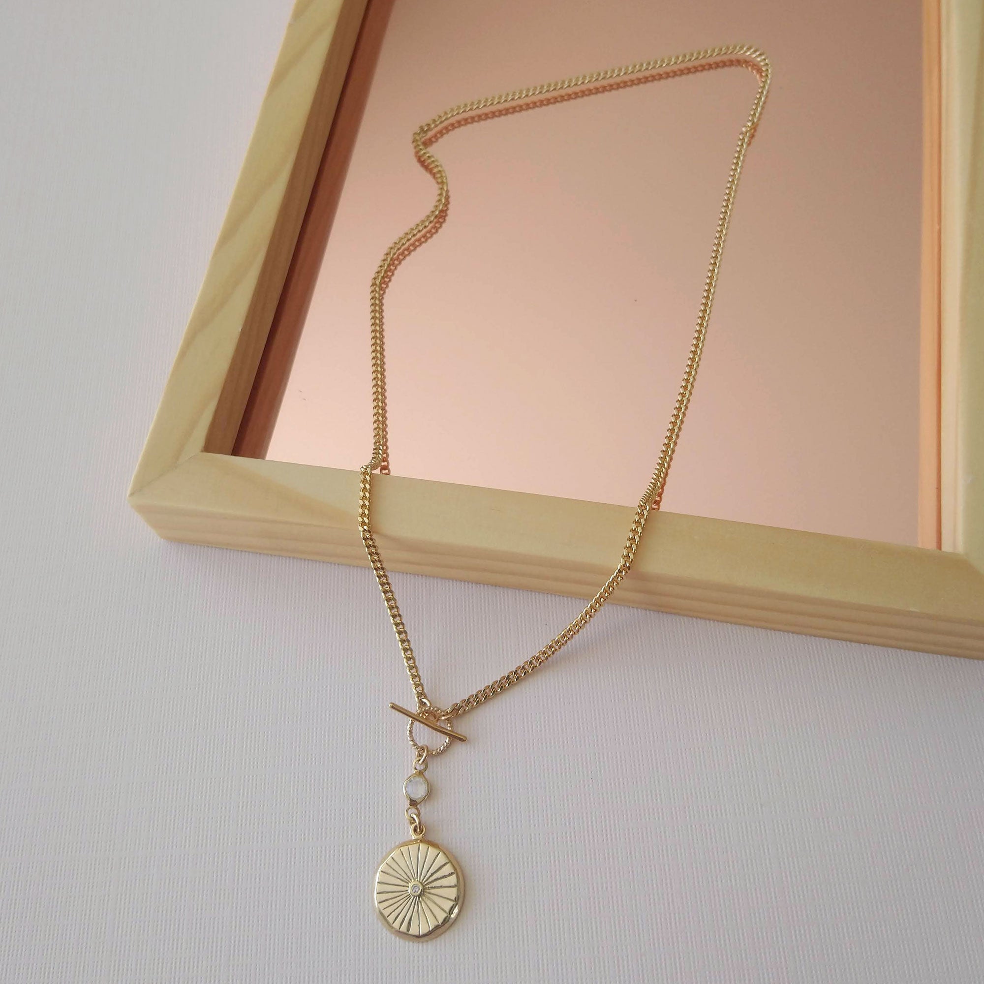 gold coin necklace with glass connector