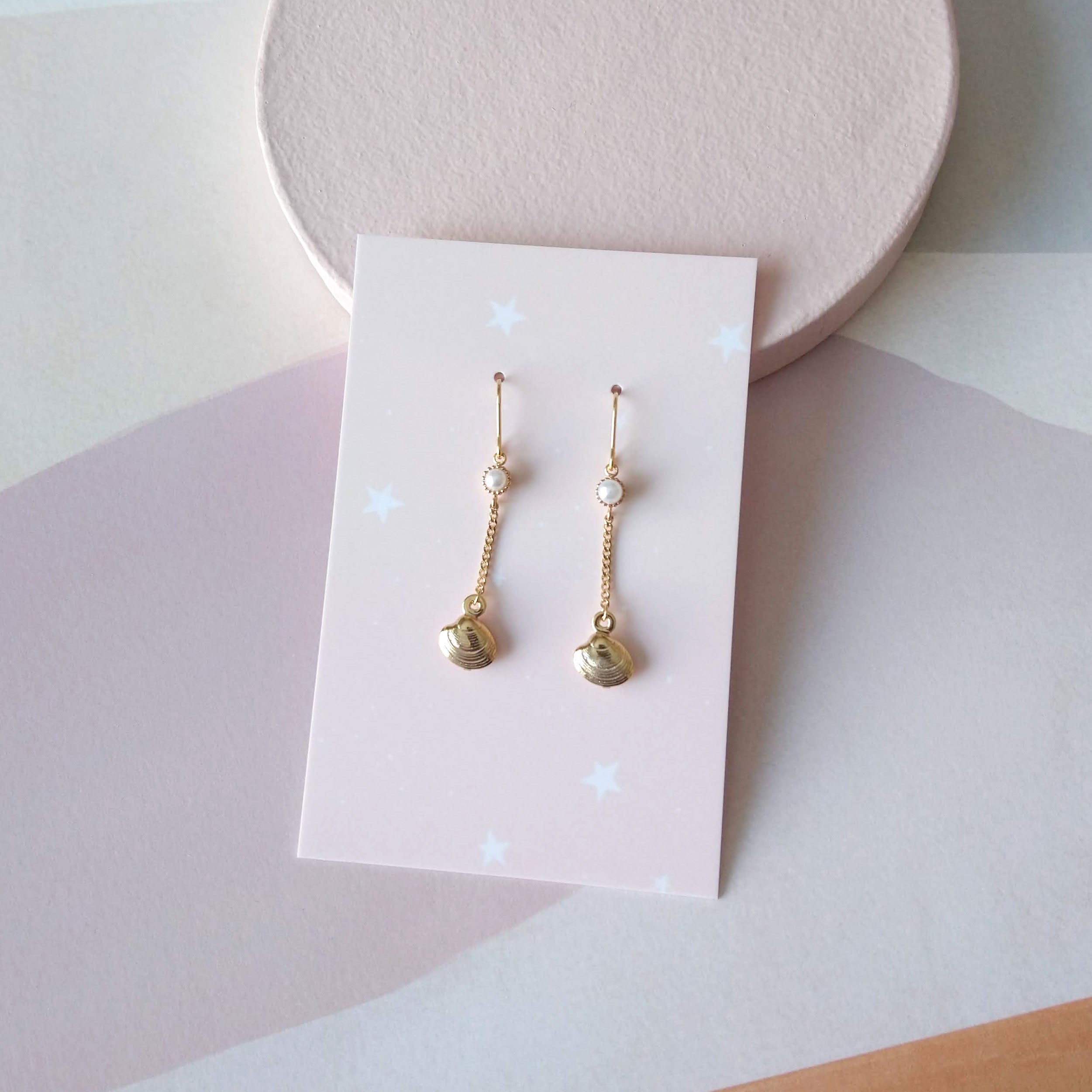 boucles d'oreilles dorées perle
