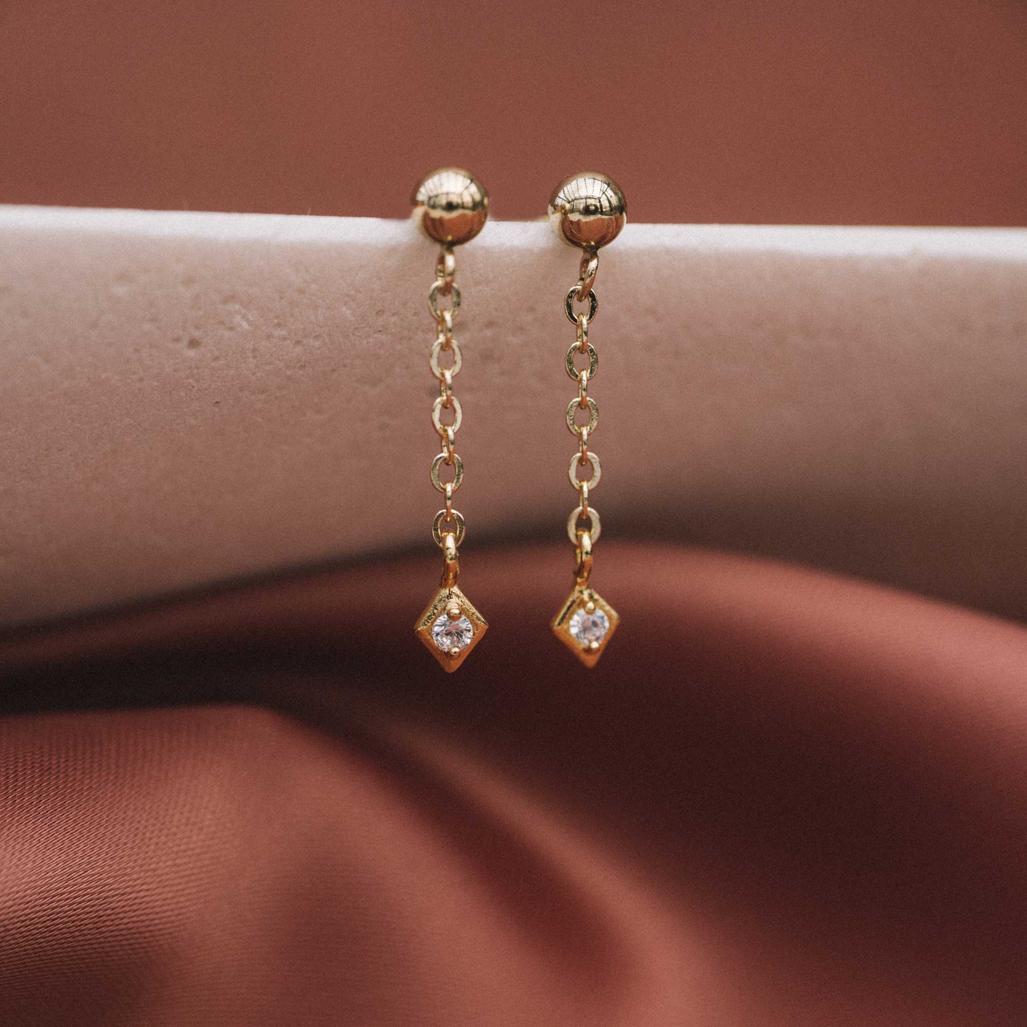 cubic and gold earrings sandrine devost jewelry